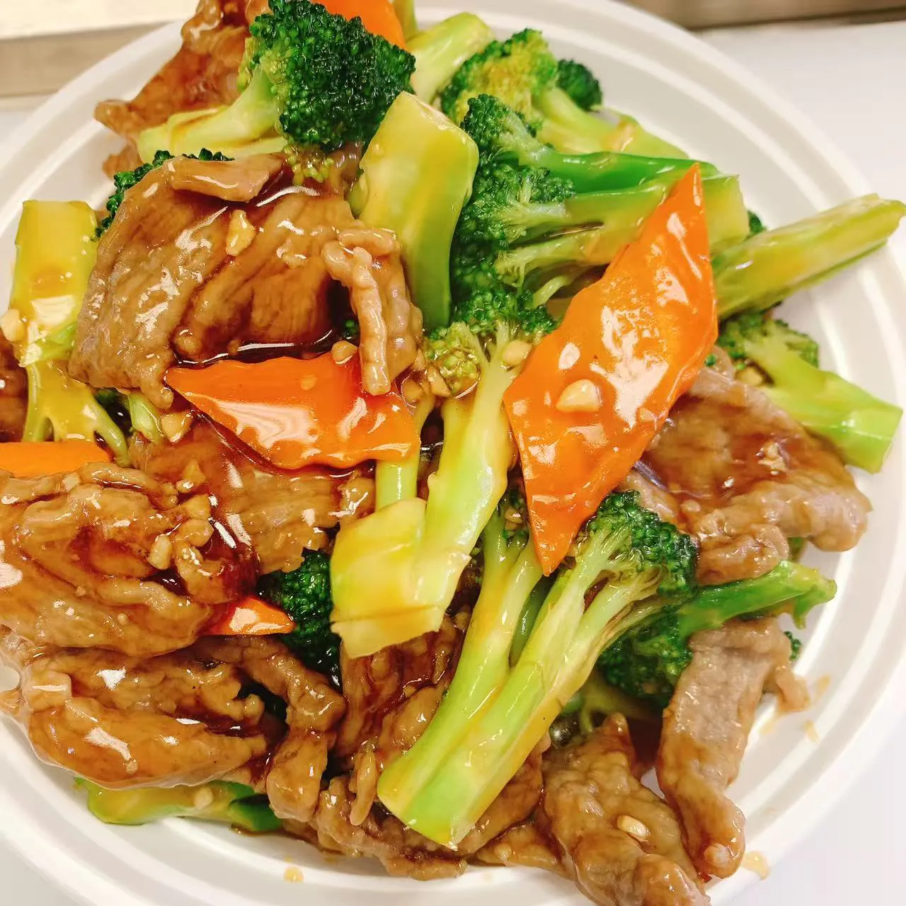 Tender beef slices stir - fried with broccoli and carrots at No.1 Chinese Food, a Chinese Restaurant in Jackson.